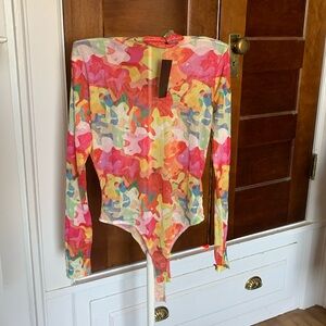 Wild Cat mesh thong bodysuit. NWT. Retail 38‎
